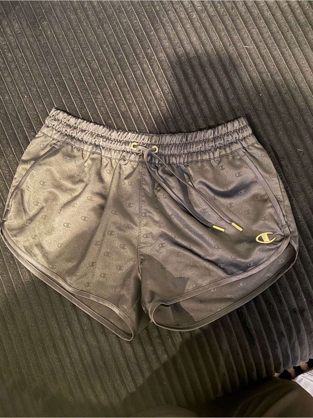 Champion Women's Black Athletic Shorts with Gold Accent